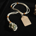Green Jade pendant with kraft tag